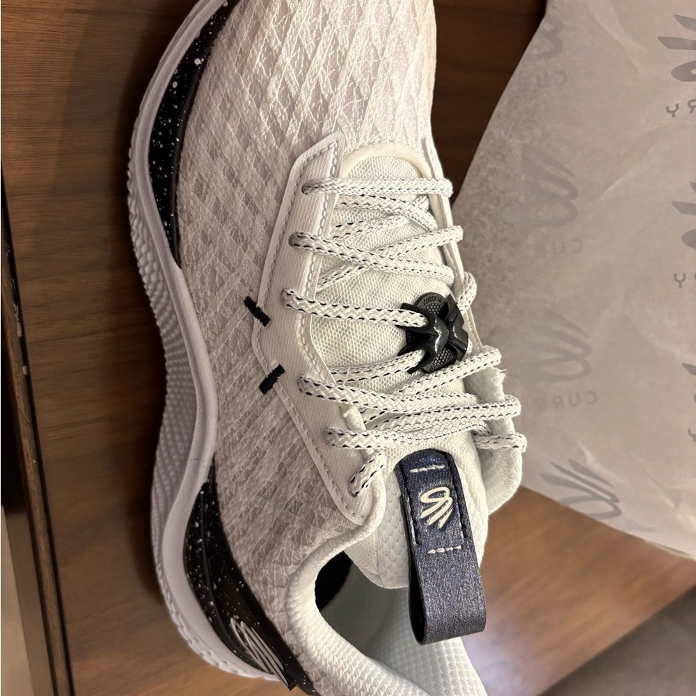Under Armor White and Black Men’s Basketball Shoe